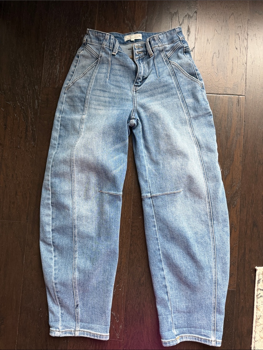 Risen Women's Light Blue High-Rise Ankle Jeans with Tapered Leg barrel